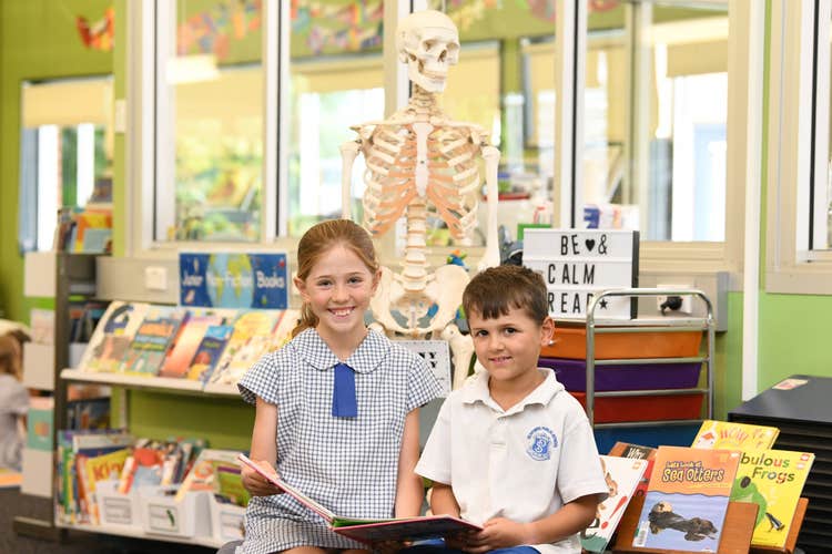 Students researching in the library