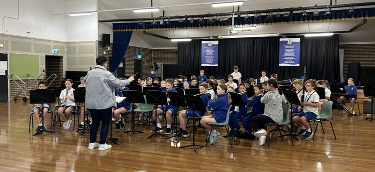 Performance band rehearsing in the Kempbridge Campus Hall